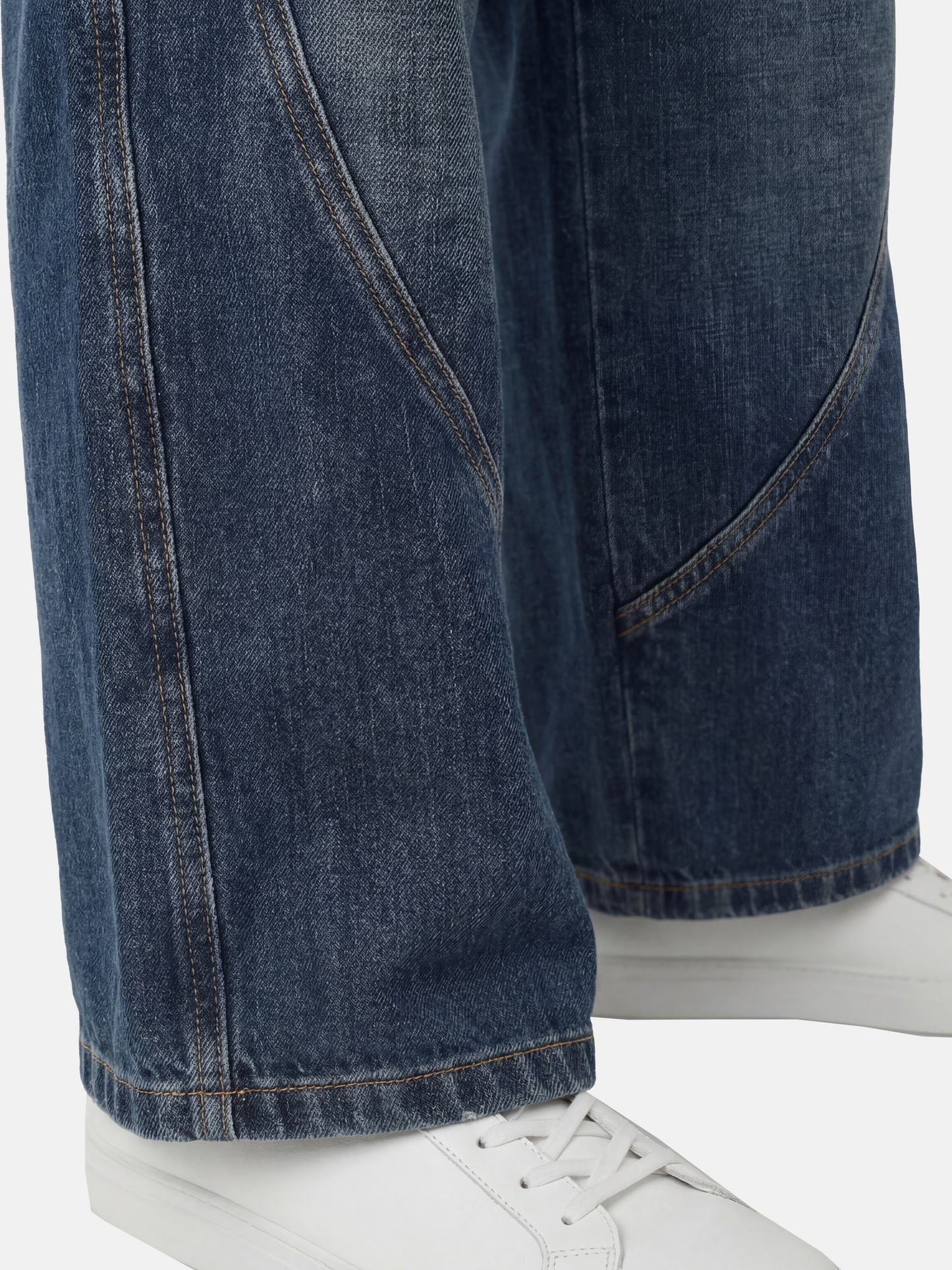 Model wearing high-rise SELVANE Sculpted Seam Wide-Leg Jeans in mid-wash pure cotton denim, showcasing the curved front seams.