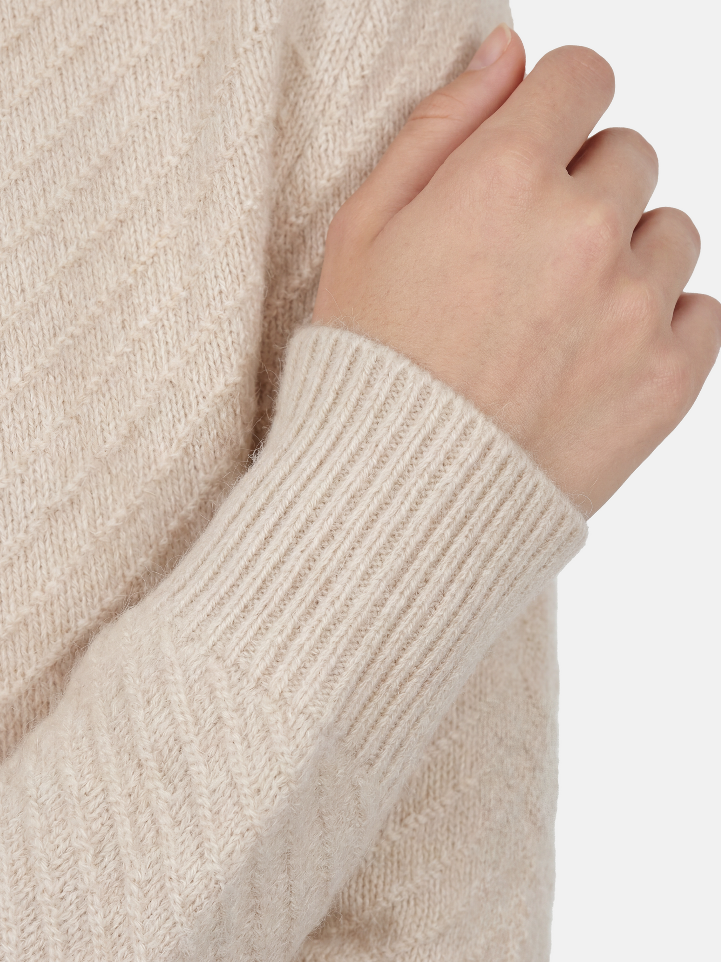 SELVANE herringbone cashmere zip-up cardigan sweater with high ribbed collar, relaxed fit, and chevron knit texture.