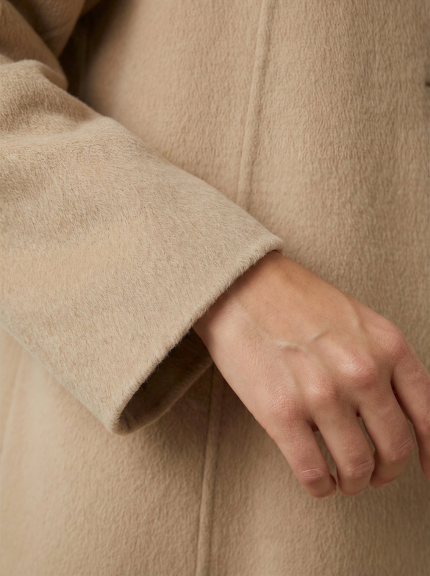 SELVANE Camel Hair Long Coat, featuring a high collar, double-button closure, and elegant straight silhouette.