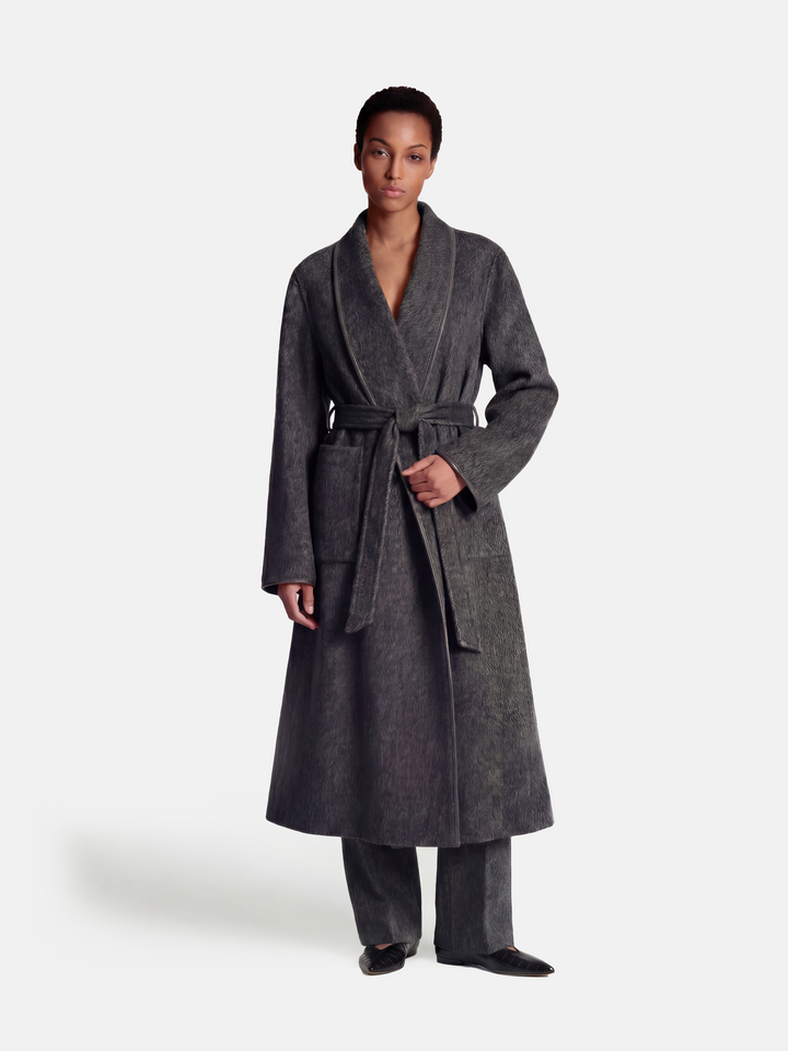 SELVANE Belted Wool Long Coat in a soft wool-llama blend, featuring a fluid drape and clean topstitched edges, worn by a model in a composed stance.