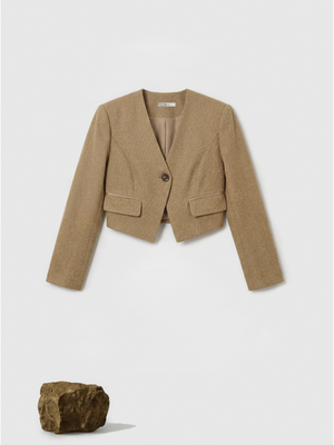SELVANE Tailored Linen Suit Set in apricot, featuring a cleanly cut jacket and sleek skirt with a subtle metallic glint.