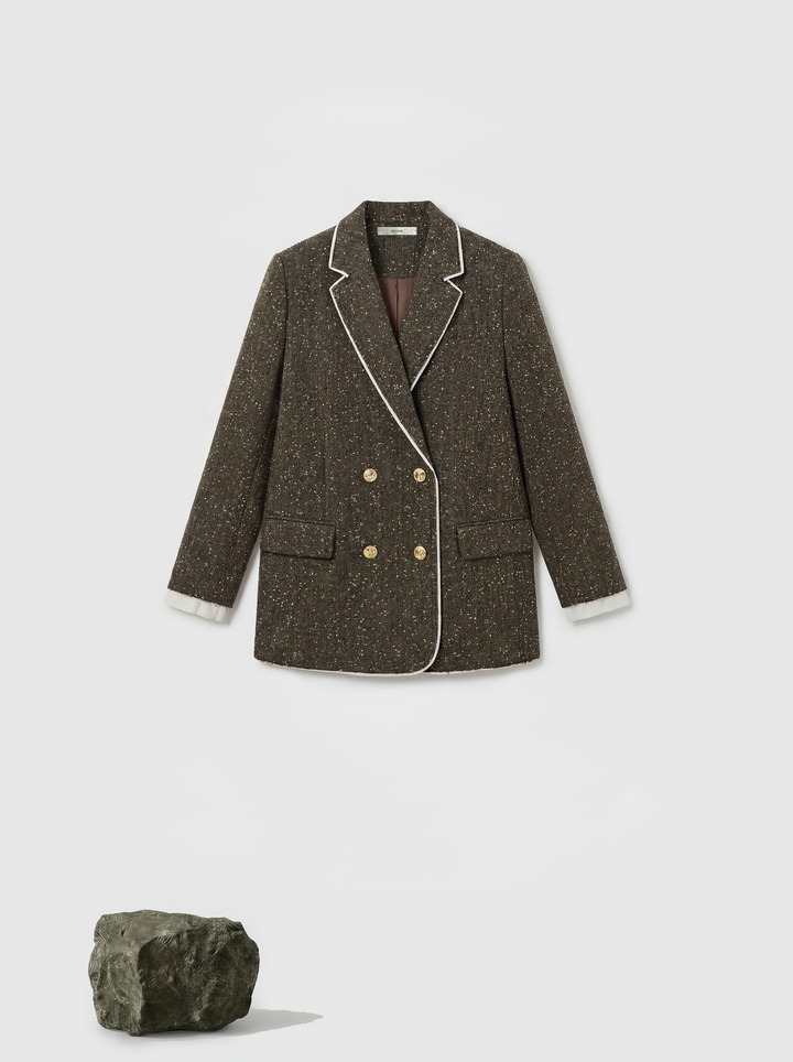 Structured coffee mélange blazer with sharp lapels, ivory piping, and gold buttons, embodying refined British tailoring.