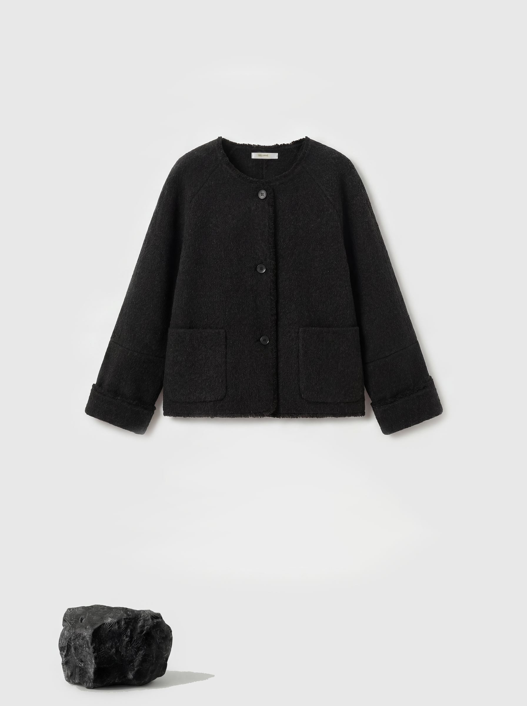 SELVANE Pure Wool Cropped Jacket in a clean round neck, soft boxy lines, and high-hip proportion, showcasing a composed drape.