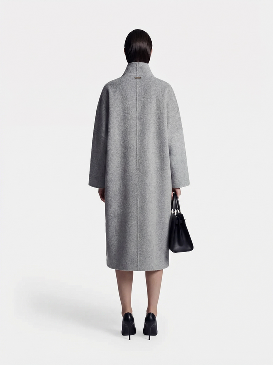 SELVANE Draped Merino Wool Long Coat, open-front, showcasing fluid drape and elongated silhouette on a model.